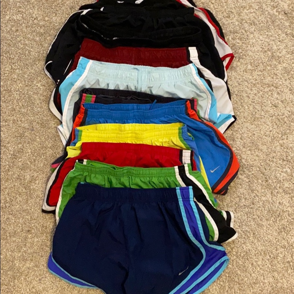 11 pairs of Nike and under Armour shorts